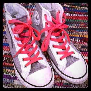 Girls high top converse.